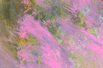 colorful creative motley background: smudged residues of oil paints on a wooden palette, short focus, selective blur