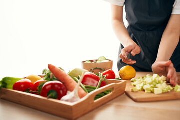 cutting vegetables on the board cooking health food