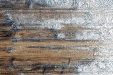 winter frosty background: boards covered with snowflakes and hoarfrost, ice patterns, wood texture, close, toning