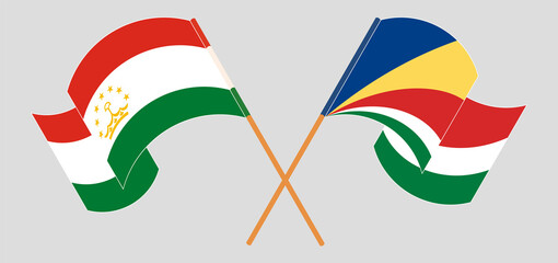 Crossed flags of Tajikistan and Seychelles. Official colors. Correct proportion