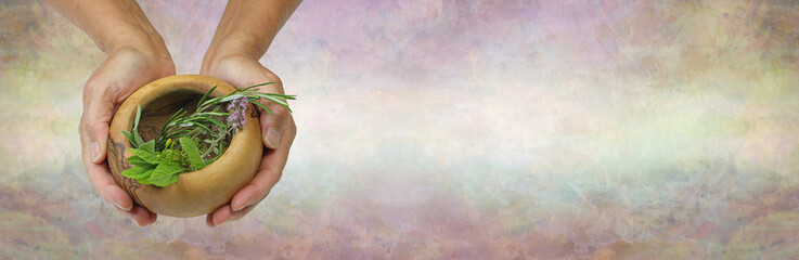 Healing Herbs Message Background - Herbalist holding wooden bowl containing selection of common...