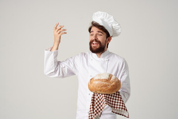 bearded man chef with bread in hand Professional emotions