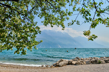 Fototapeta na wymiar View of the beautiful Lake Garda surrounded by mountains,Riva del garda and Garda lake in the spring time,Trentino Alto Adige region