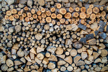 Wooden logs piled up into a stack,in the countryside of Durmitor,Montenegro.