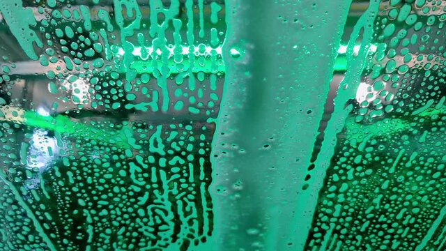 Close up shot of some bubble foam during car wash