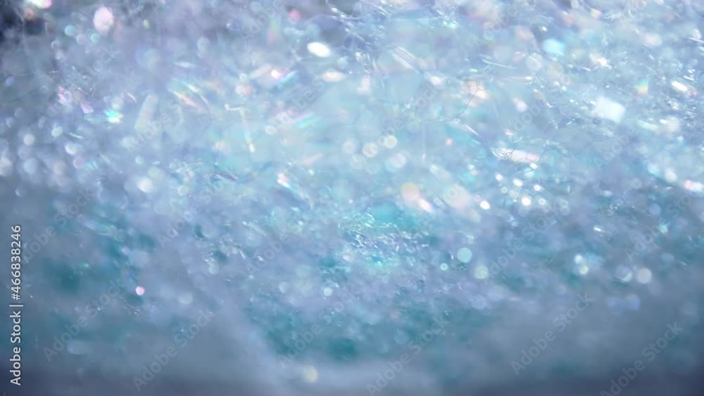 Poster blue color bubbles macro in rotating for background and design.