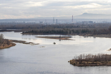 Industrial landscape of the right bank of Krasnoyarsk, high chimneys over the city