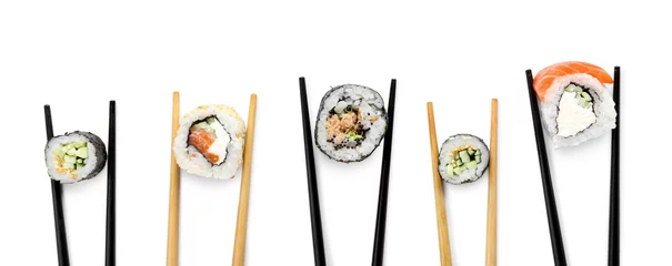 Fotobehang Chopsticks with tasty sushi rolls on white background © Pixel-Shot
