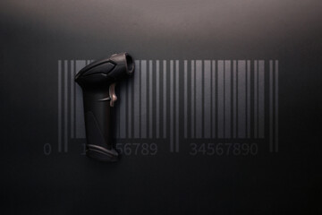 Barcode concept. Retail label barcode scan. Reader laser scanner for warehouse on black background. Warehouse inventory management.