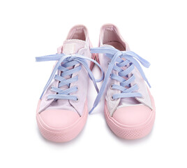 Stylish pink shoes with tied laces on white background