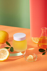 Lemon extract in a transparent podium  , template lemon juice in a test tube with green background...