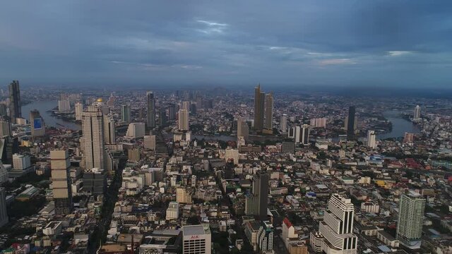 Bangkok thailand aerial city view drone footage over the city. skyscraper and high rise buildings at sunset. 4K aerial city
