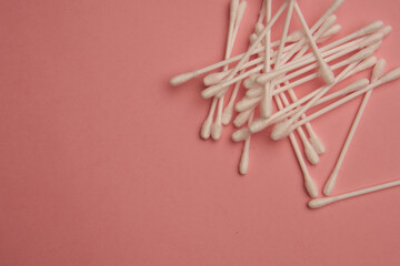 cotton swabs hygiene protection sanitation pink background