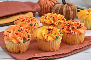 Festive holiday cupcakes with candy sprinkles