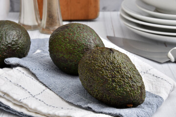 Fresh ripe avocado on a towel