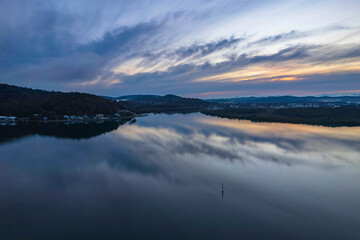 Sunrise and cloud reflections waterscape