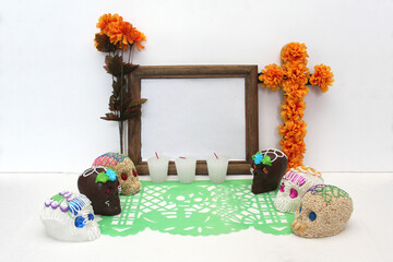 Sweet in the shape of a skull made of sugar, chocolate and amaranth as an offering for the Day of...