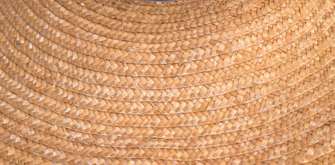 Wicker backgrounds. Braided hat surface.