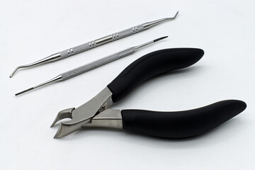 Nail Nipper. Ingrown toenail file and lifter set isolated on white background