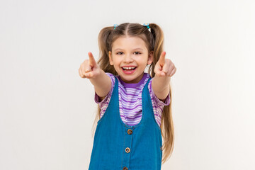 The child points two fingers forward. White background.