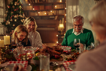 Three generations family at Christmas lunch