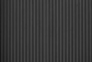 black striped steel wall background and texture.