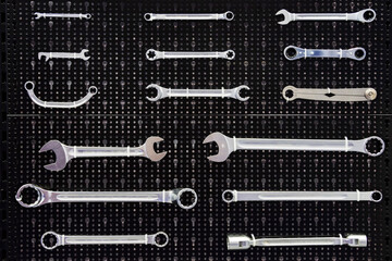 Wrenches tool on stand, exhibition dark background.