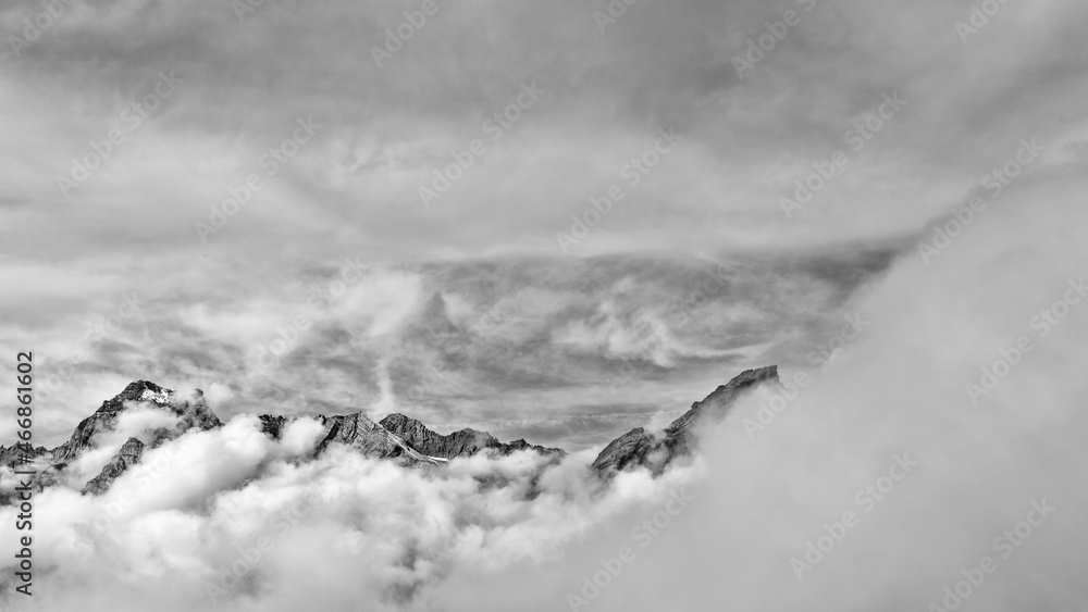 Wall mural Black and white landscape in the Alps mountains