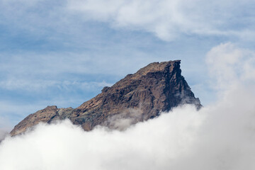 Beyond the clouds, the Rothorn (also know as Red Peak) 