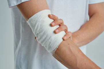 male patient bandaged hand injury to fingers hospital medicine