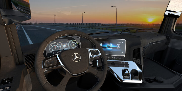 View from behind the steering wheel on the cockpit of a new electric Mercedesa E-ACTROS truck