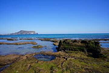 a beautiful rock coast with clear water