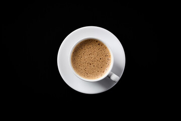 Cup of coffee on black background. Top view. Copy space.