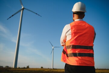 Wind turbines generating electricity. energy conservation concept.