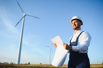 Wind turbines generating electricity. energy conservation concept.