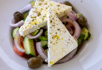 Greek salad with feta cheese. Typical delicious greek style lunch