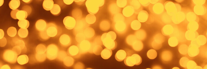 new year's holiday orange background with bokeh