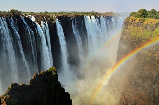 Mosi-oa-Tunya (The Smoke which Thunders) featuring double rainbow, Victoria Falls National Park, Zimbabwe