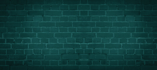 Dark green colored colorful damaged rustic brick wall brickwork stonework masonry texture...