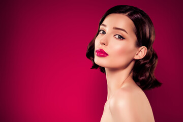 Fototapeta premium Tender. Photo of charming lady face have make up stand empty space isolated on dark burgundy background