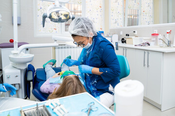 Obraz premium for Children use application anesthesia - gel is applied to gum before injection