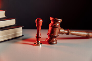 Gavel and stamp on a lawyer's desk