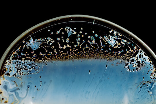 macro of soap bubbles made with dish soap on black background
detergent bubbles. Imitation of an unknown planet. Children's entertainment. Science fiction.
macro of soap bubbles like Planet, ocean wav