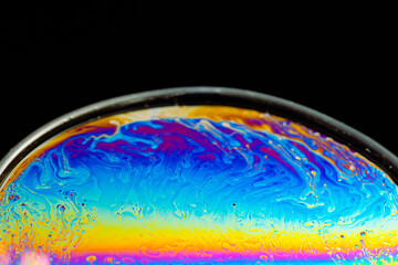 macro of soap bubbles made with dish soap on black background
detergent bubbles. Imitation of an unknown planet. Children's entertainment. Science fiction.
macro of soap bubbles like Planet, ocean wav