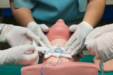 simulation pierced their throat to breathe, Cancer patients are punctured to cure their throat.
