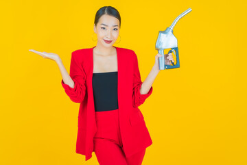 Portrait beautiful young asian woman feul gas pump