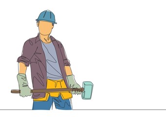 One single line drawing of young construction builder wearing uniform, tools belt and helmet while holding hammer. Craftsman home repair service concept. Continuous line draw design illustration