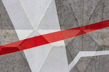 Fototapeta premium Red and white lines drawn on the fence. Abstract illustration.