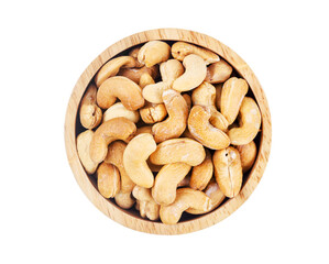 Big pile of cashew nuts in wooden bowl isolated on white background.