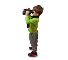 The boy looks through binoculars. Photo in the studio.